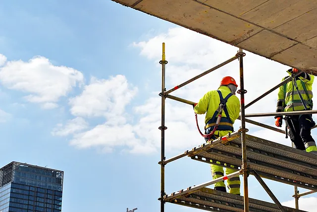 A team of scaffolds working on scaffolding 